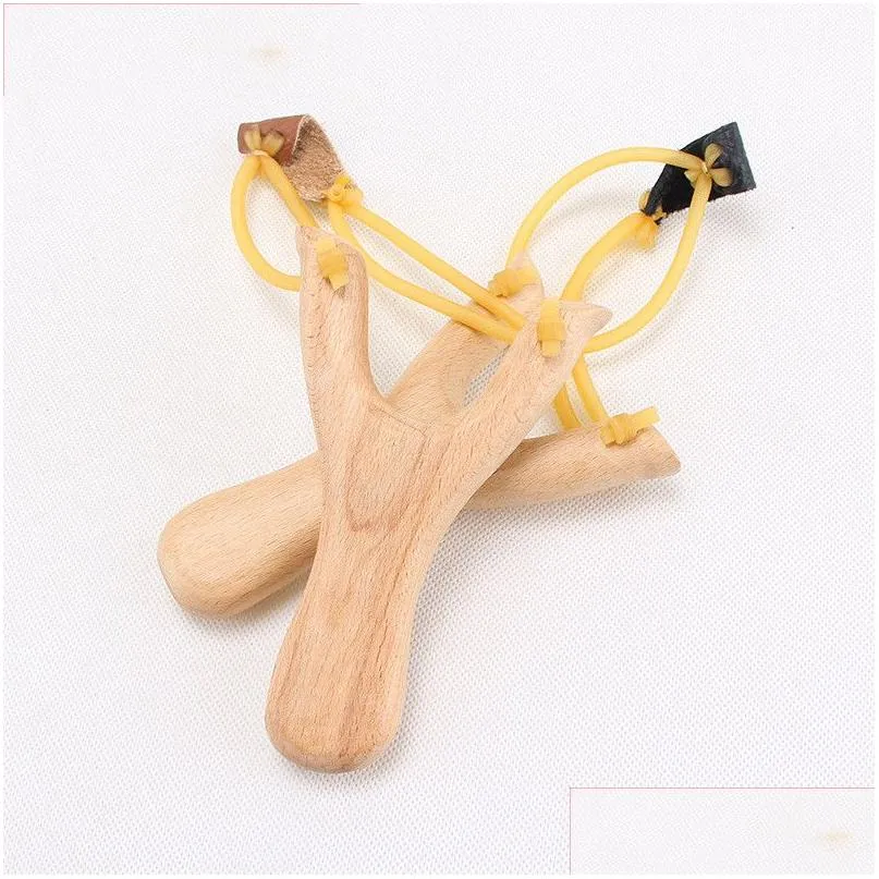 Другие ручные инструменты Детские деревянные стропы Резиновая веревка Традиционные охотничьи инструменты Детские игровые слинги на открытом воздухе Ss Игрушки для стрельбы Ручные Woo Dhp6S