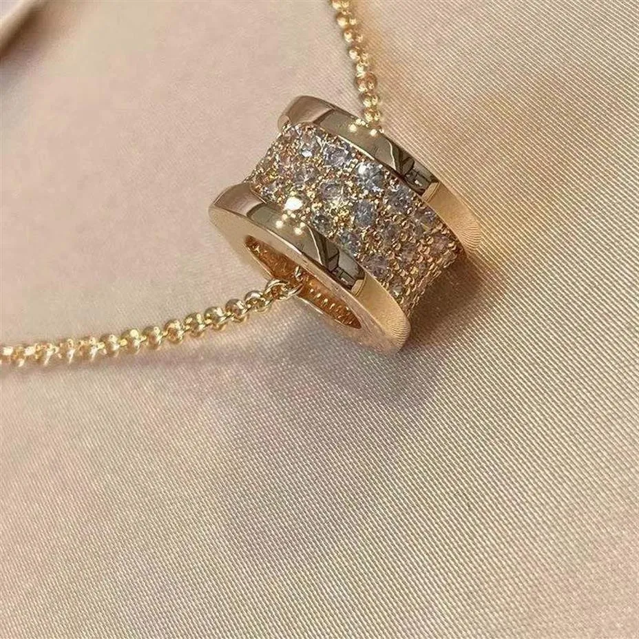 豪華なファッションダイヤモンドペンダント高品質のスライドシルインディカルネックレスクリエイティブデザインジュエリーと絶妙なパッケージングボックス2330