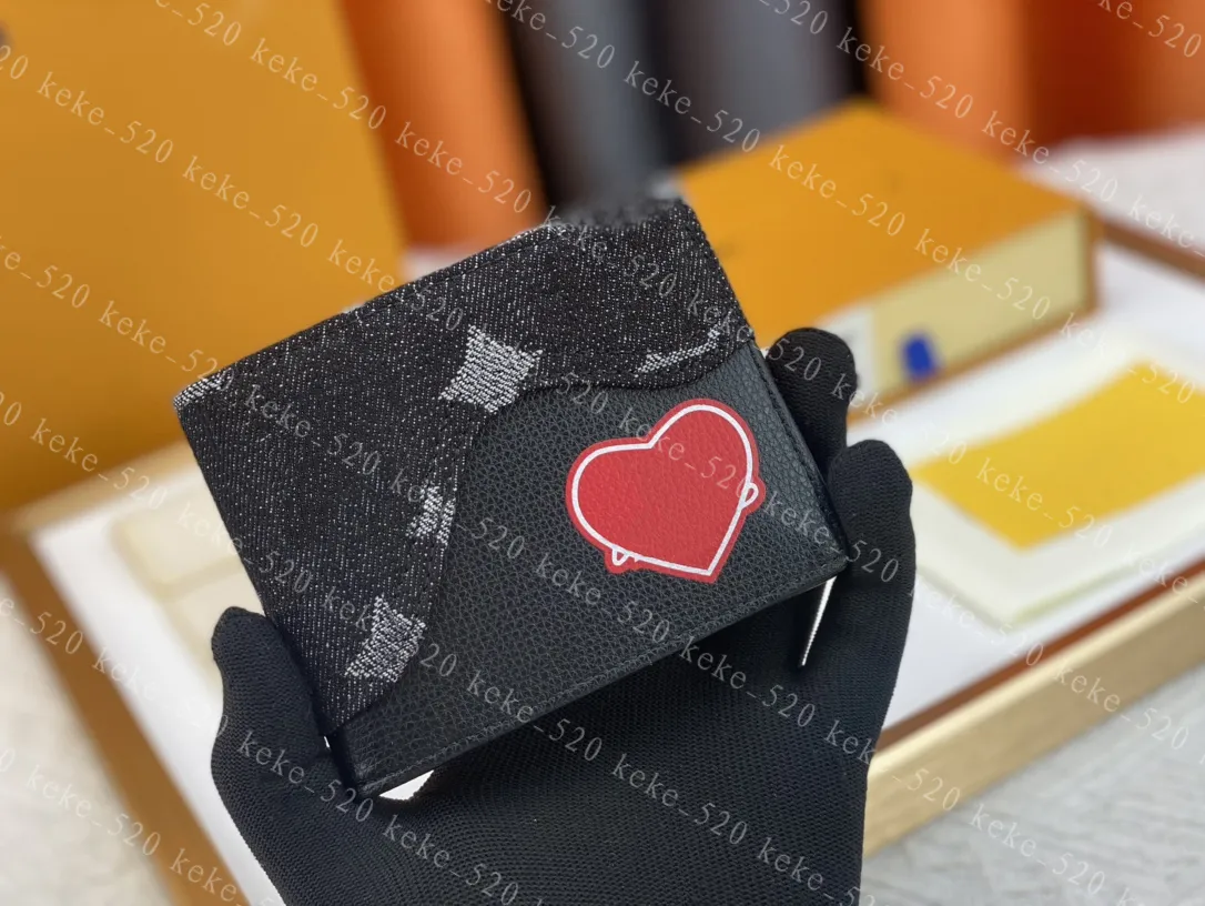 M81020 Slender Women Luxurys Designers Kort plånböcker Läder och denim Patchwork Handbag Classic Flower Heart Mönster