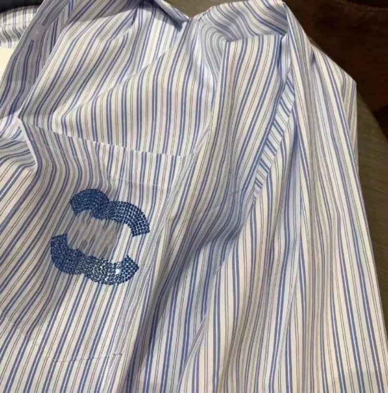 Vertical striped shirt women spring and summer new designer letter T-shirt women`s niche loose long-sleeved sun protection shirt top