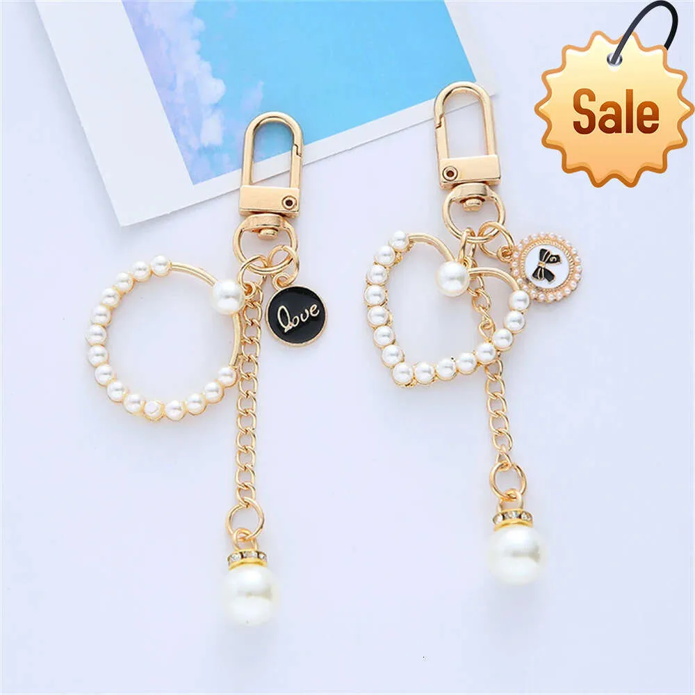 Girl Heart Pearl Love Key Chain Kedja Kvinnlig hörlurfodral Pendant Ornament Small Princess School Bag Hanging Accessories Gift