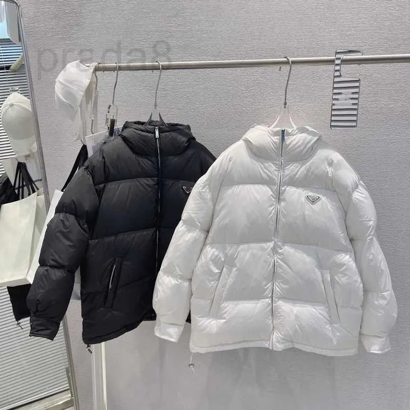 Parkas de plumón para mujer, diseñador de invierno 2023, nueva moda de lujo, etiqueta pequeña triangular, abrigo de plumón de ganso blanco 90, abrigo cálido KNTS