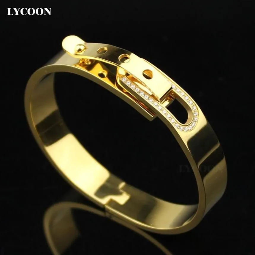 Mode kvinnor manschettform speciella låsarmband armband 316l rostfritt stål naglar armband gult guld med cz250b