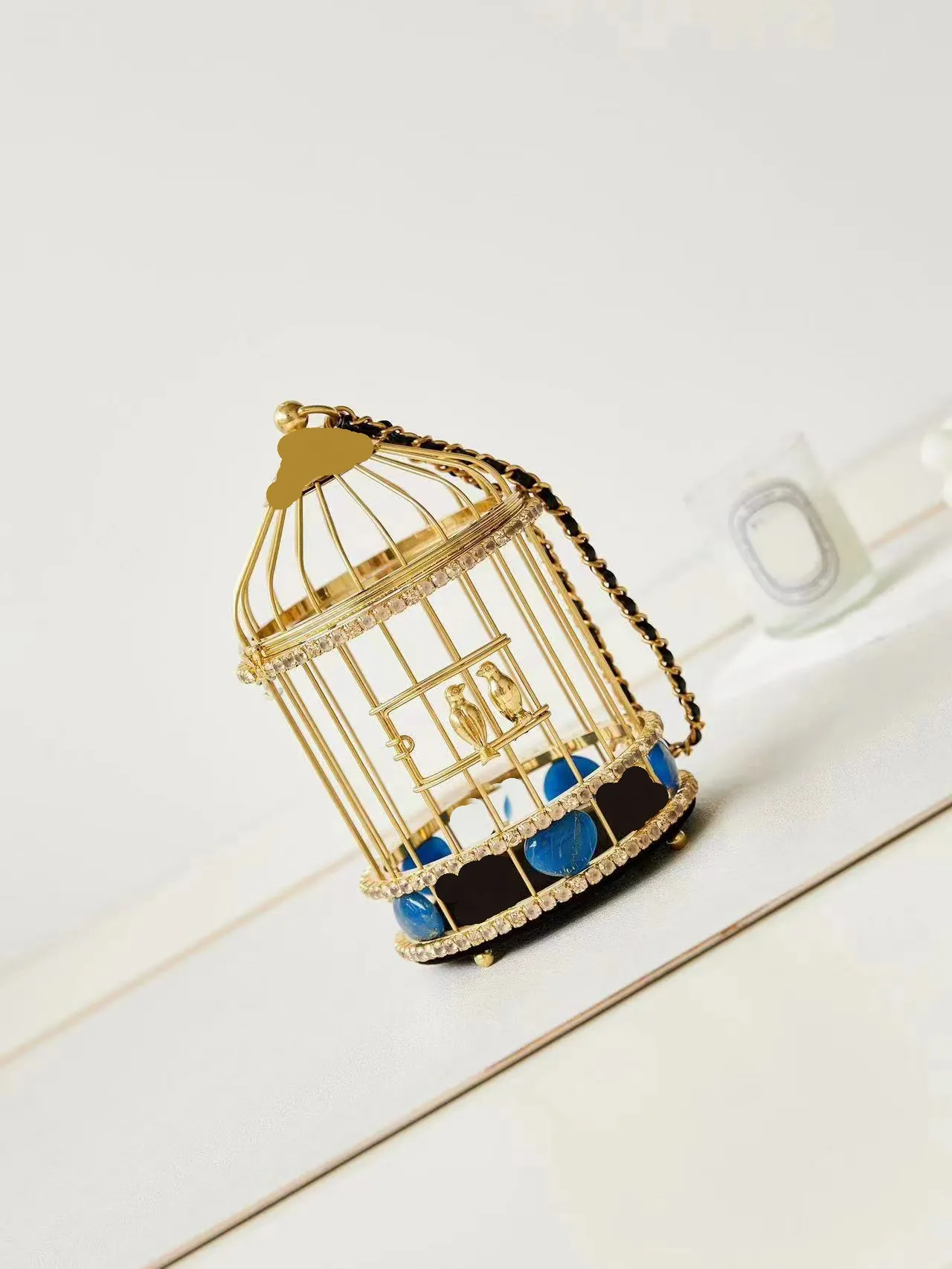 Gold cage purse hotsell