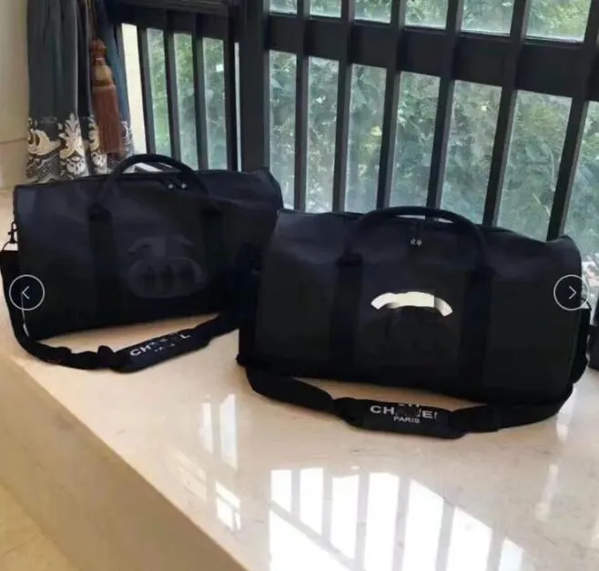 Homens de moda de luxo de alta qualidade Mulheres viajam para maldas bolsas de designer de marca Bolsas de bagagem