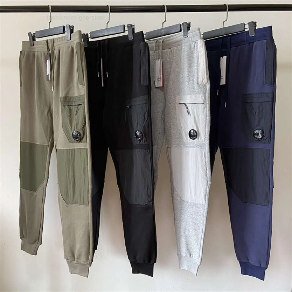 Męskie spodnie 9 kolorowe polarowe polar Mieszane użyteczność jedna soczewka Pocket Pand Outdoor Men Men taktyczne spodnie luźne rozmiar dresu m-xxl cpsmlxl