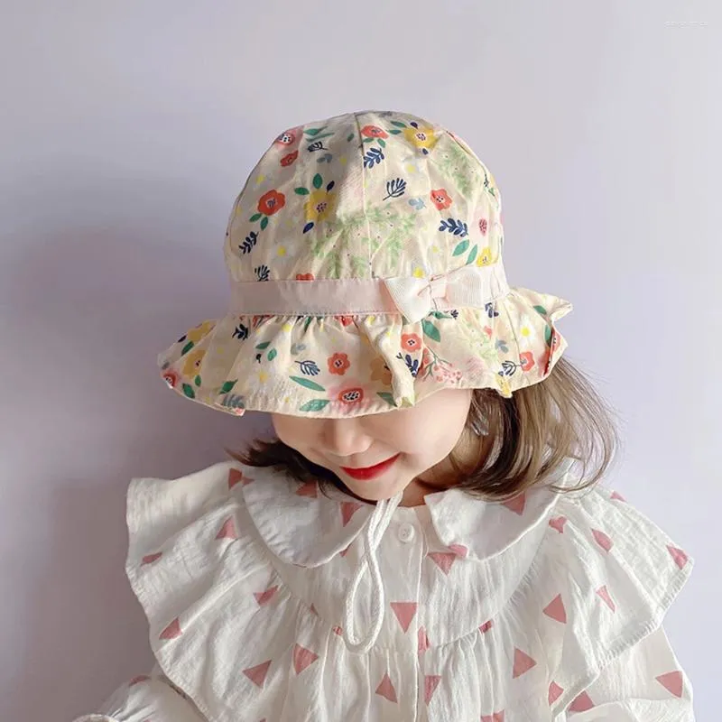 Berretti Cappello da pescatore dolce per bambini Ragazza Protezione UV estiva Cartone animato Neonate Fiocco floreale Cappelli da sole per esterni Berretto con cordino per bambini