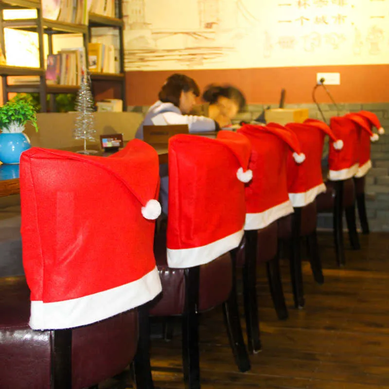 Kerstversiering creatieve lay-out decoratieproducten Restaurant Stoelhoes Kerstmutsproducten
