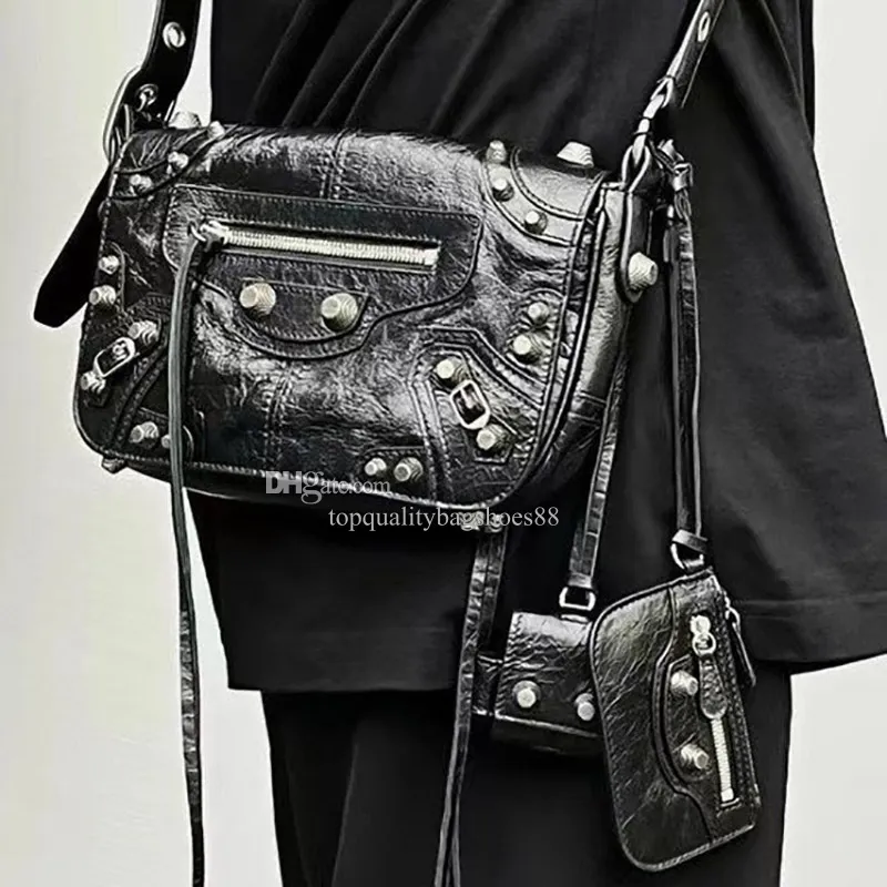 Le Cagole Mens XS Flap Bag In Black Arena Leather With Aged Le Cagole Mens XS Flap Bag In Black Arena Leather With Aged