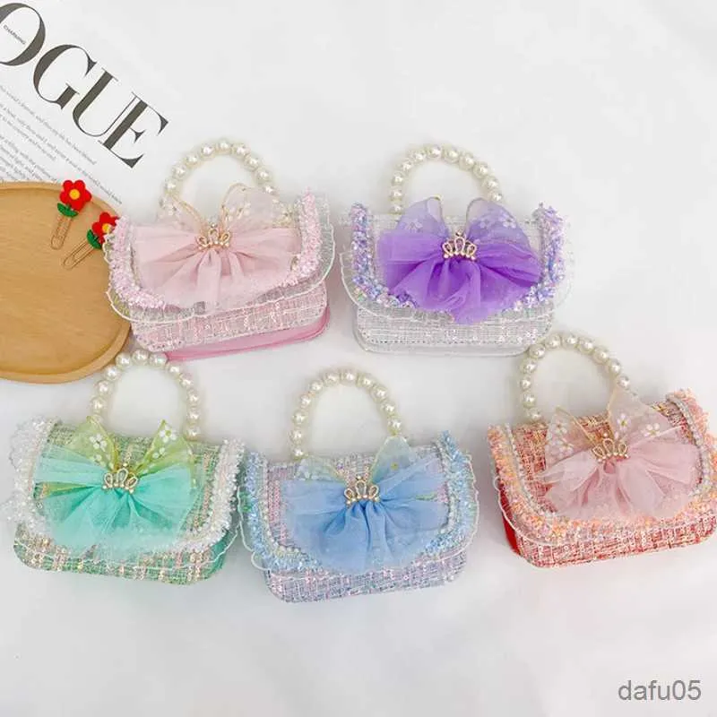 Nuevos bolsos de mano con lazo para niños, bandolera con cadena de lentejuelas, bolsos con perlas dulces para niñas, bolso para vestido de princesa, monedero pequeño, bolso de hombro