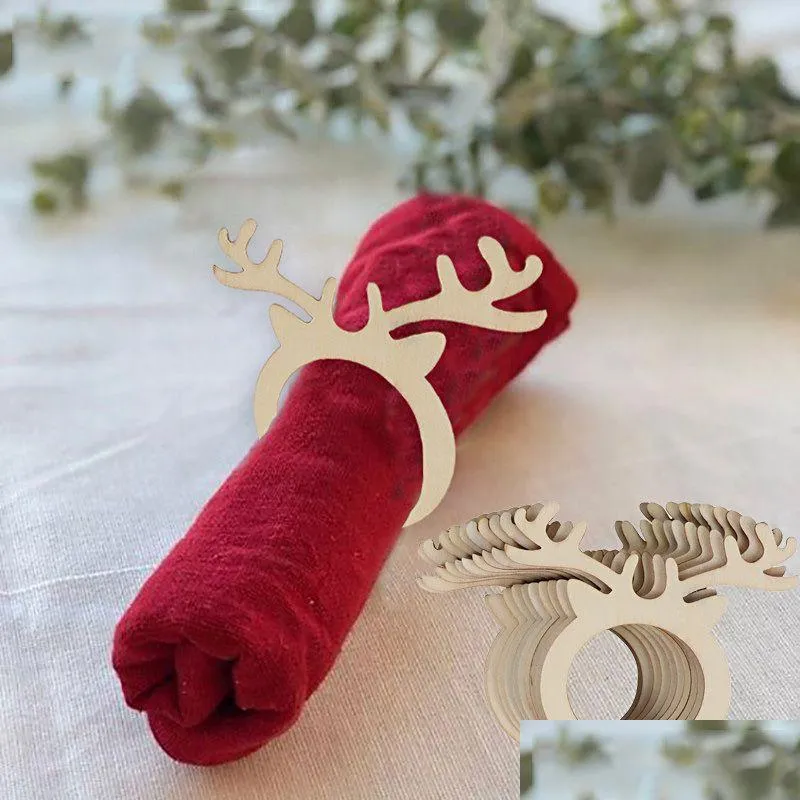 Masques de créateurs 10pcs Porte-anneaux de serviette de Noël Décoration de table de Noël pour la maison en bois Corne de renne Tissu Année Navidad Décor Noe Dhtci