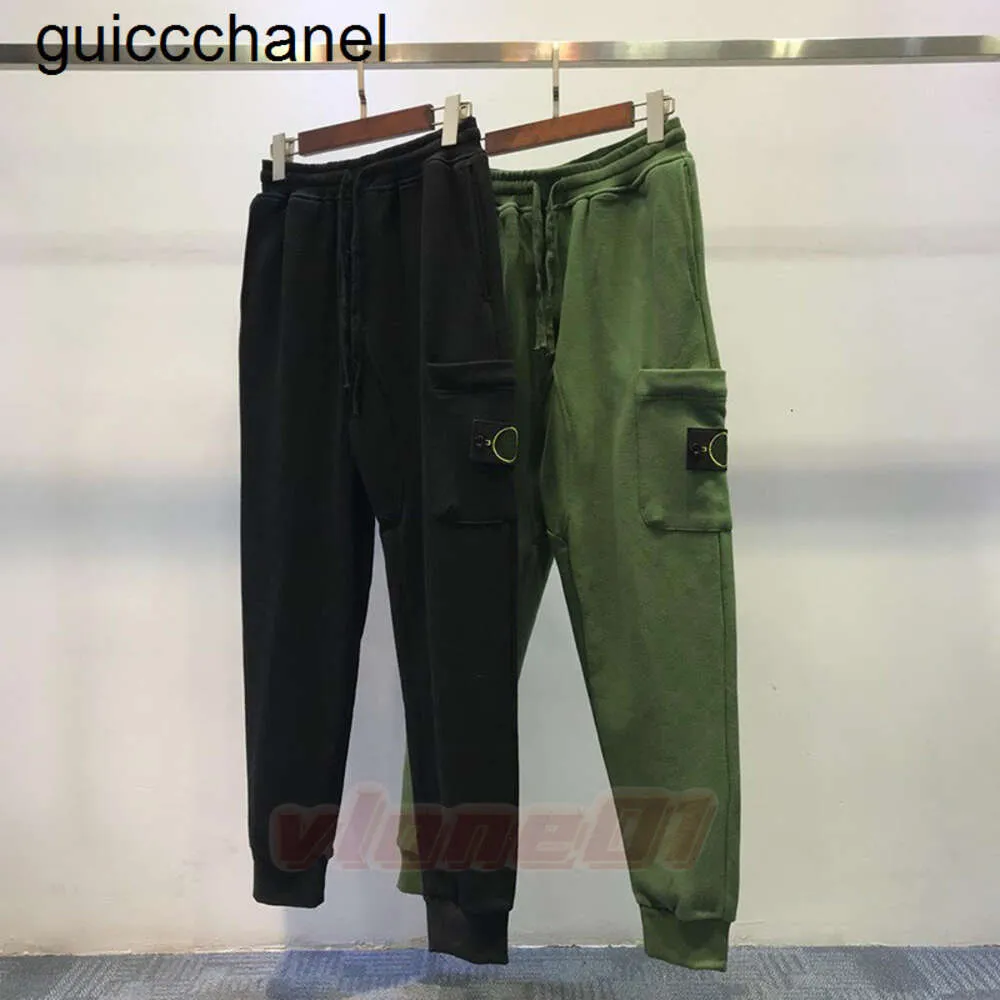 Novo 23ss Mens Designer Track Pants Womens Casual Cargo Multi-bolso Harem Calças Marca de moda Calças de cintura elástica Sportswear mulheres calças masculinas