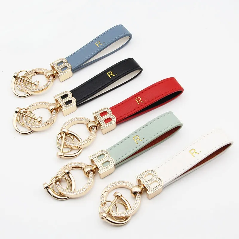 2023 Högkvalitativ nyckelring Klassisk utsökta lyxdesigner Kai Keychain Zinc Alloy Letter Unisex Lanyard Gold Metal Trinket