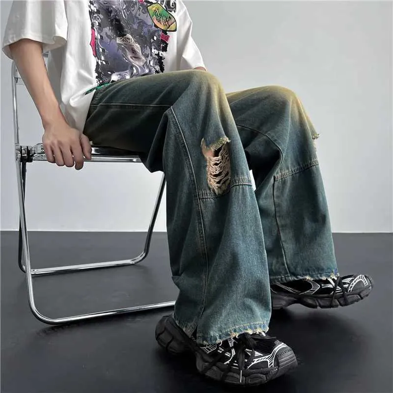 メンズパンツメンズヒップホップリッピングホールジーンズ韓国カジュアルハイストリートストレートパンツルーズワイドレッグビンテージブルーロングズボンの男性服