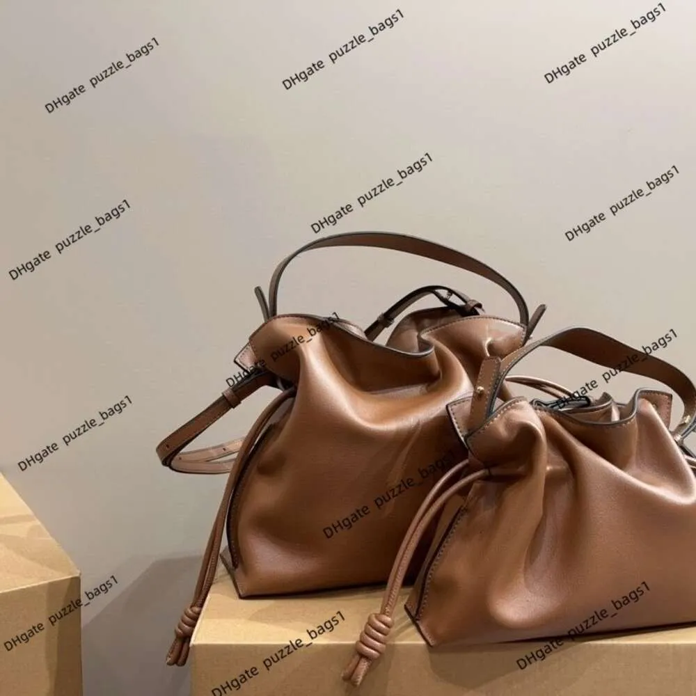 Avancerad varumärke Lucky Bag Women's Handbag Ny äkta läder dragsko vikning av tyg klassisk cowhide stor kapacitet handhållen crossbody väska