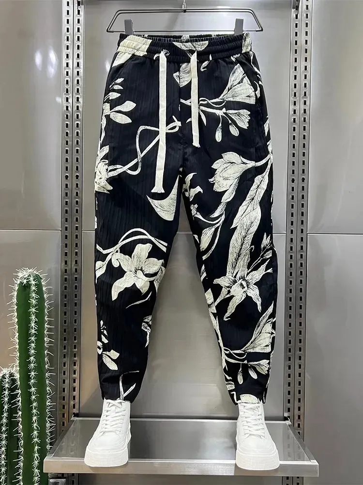 Men s byxor jogger lös randig blommig hiphop streetwear högkvalitativ harem byxor unika designer märke kläder 231025