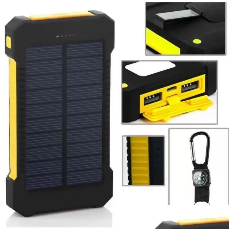 Andra elektroniska komponenter Partihandel 20000MAH Solar Power Bank Charger med LED -ficklampa Comass Cam Lamp Double Head Battery Pan Dhnml