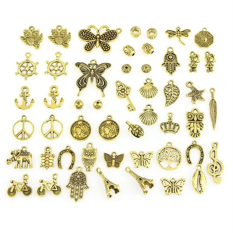 Gemengde Ontwerpen Retro Gouden Kleur Sleutel Roer Shell Schildpad Vogel Hand Toren Fiets Vlinder Uil Bedels Voor DIY Sieraden Fitting 50pc175v