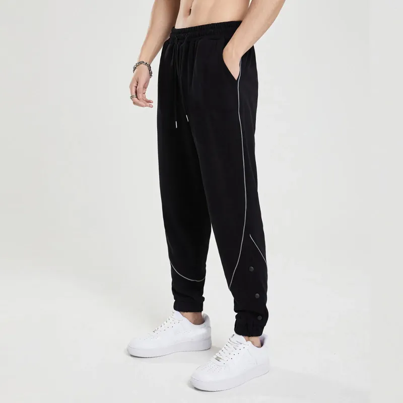 Pantaloni da uomo Pantaloni sportivi elasticizzati alla caviglia tinta unita Pantaloni da jogging a gamba larga Pantaloni larghi con lacci Pantaloni sportivi cool