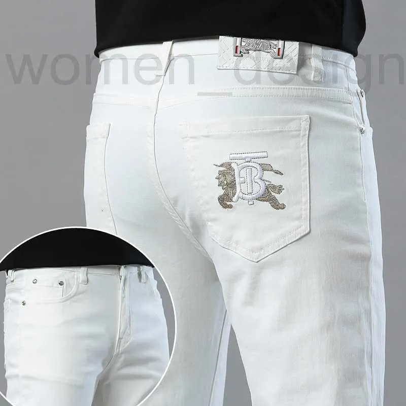 Jeans pour hommes designer printemps / été nouveau pour la lumière de luxe édition coréenne pieds élastiques minces coupe ajustée coton balle anti tache blanc B pantalon parental jean de créateur