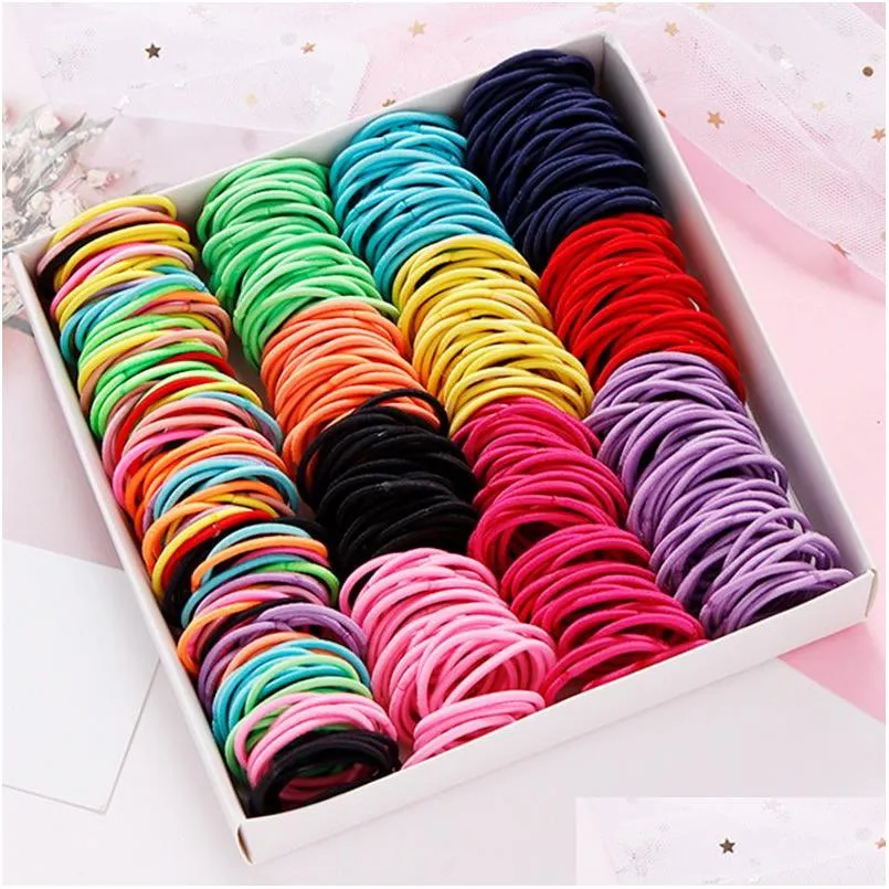 Gumki do włosów 100pcs/set dziewczęta koloru nylon podstawowe elastyczne opaski do włosów dla dzieci Pigtails