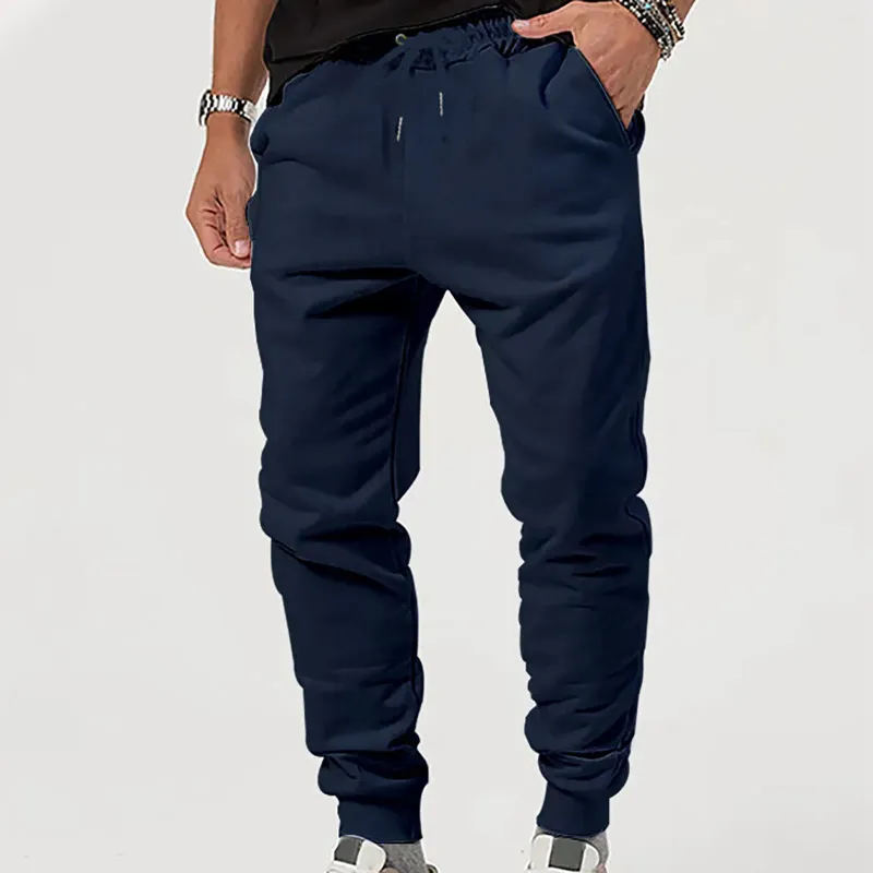 Pantalons pour hommes Joggers minces entraînement pour la course à pied en salle de sport et le bodybuilding pantalons de survêtement athlétiques avec poches profondes