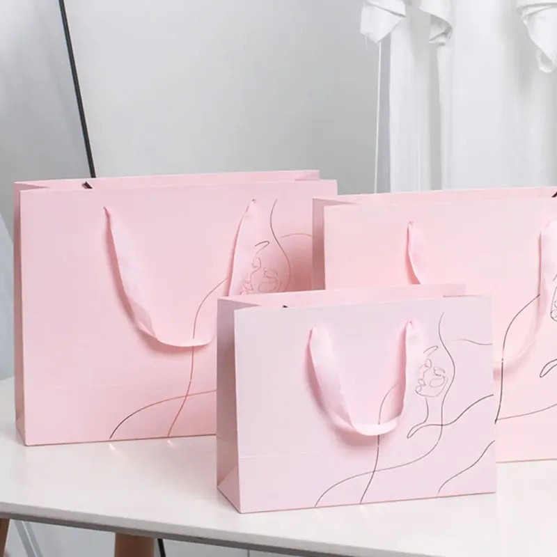 Shopping Bags Luxury Rose Gold Stamping Printing Pink Handle Bag Custom Paper Packaging With Silk Ribbon Gift