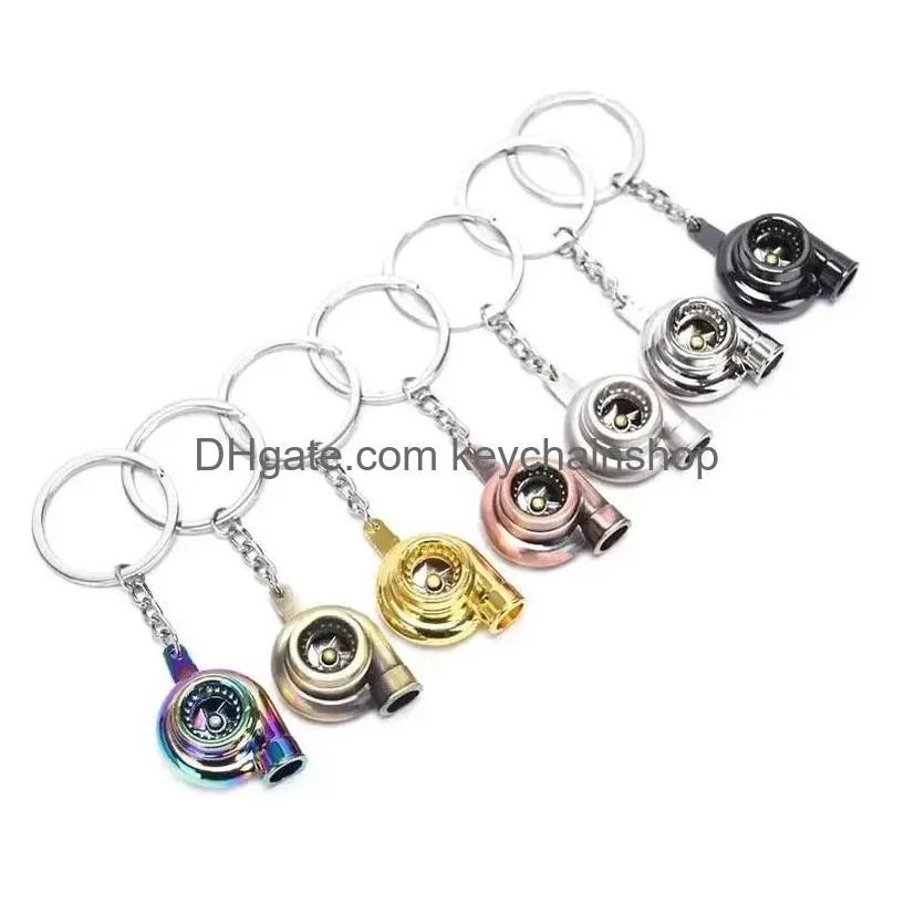 New Metal Turbo Keychain Sleeve Bearing Spinning Part Model Turbine Turbocharger Key Chain Ring 7 Colors Drop Delivery Dhcok