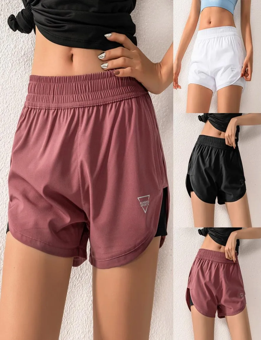 Running shorts kvinnor tillbaka blixtlås pocket mesh andningsbar ladie flicka kort solid sömlös träning yoga korta gym shorts sportkläder1972721