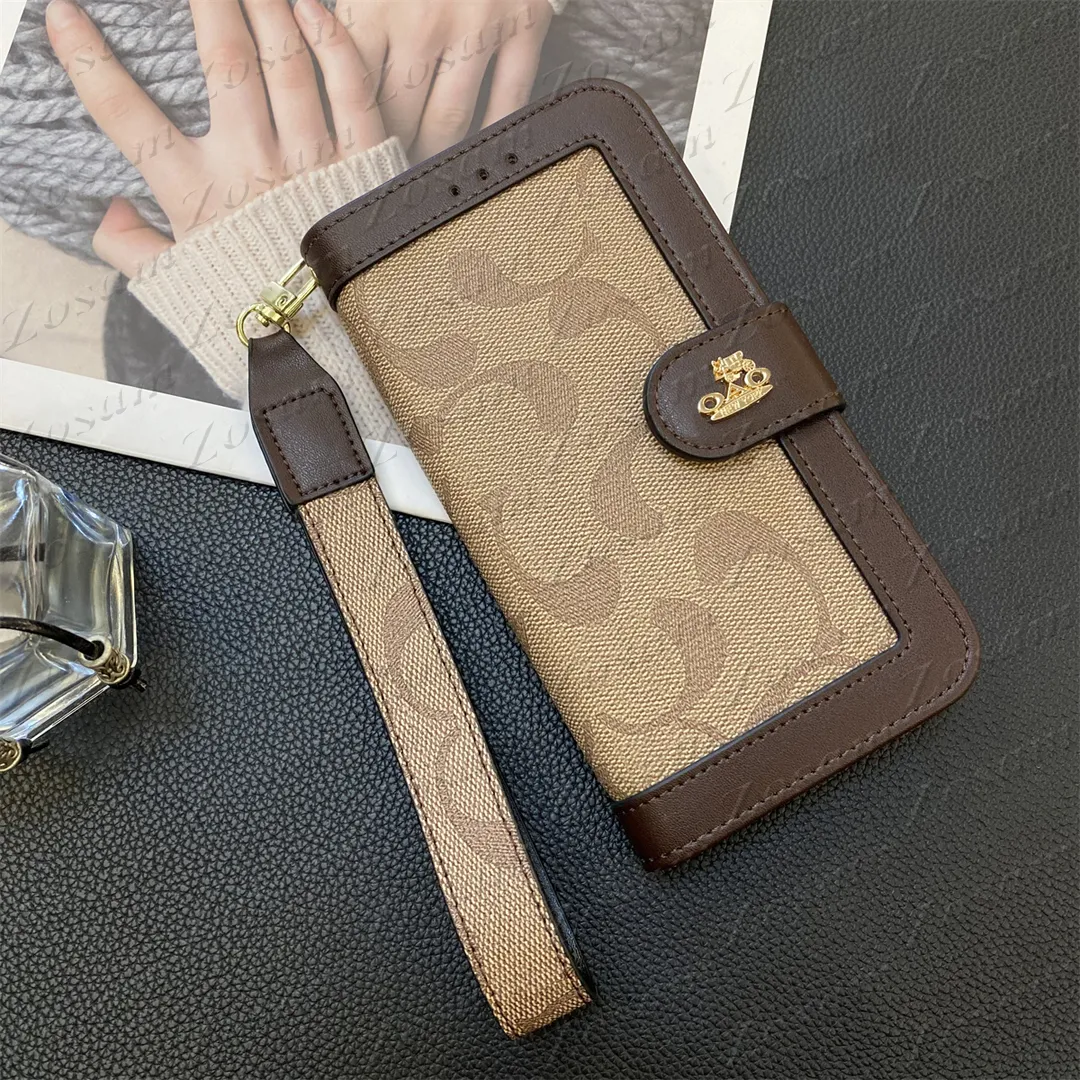 Designer wallet with wrist strap hotsell