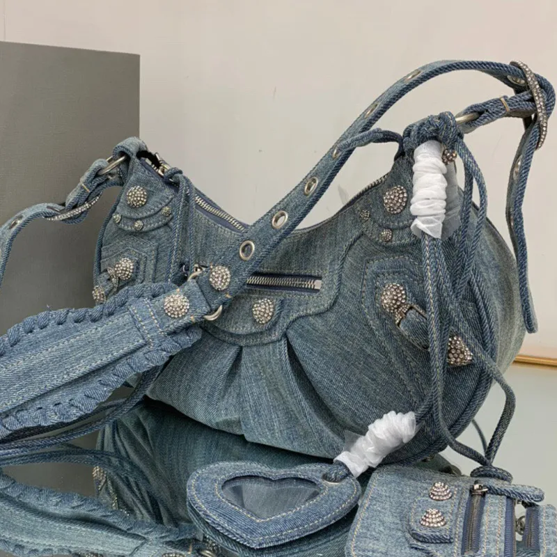 Borsa di design di alta qualità Le Cagole Denim Borsa a tracota Crescent Rivets Borse per moto per motociclette da uomo Uomo da donna Donne Crovacco