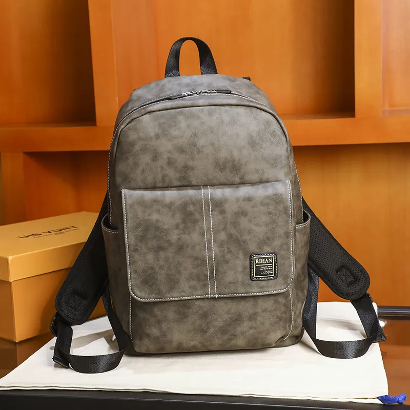 Wholesale men leathers shoulder bags retro large capacity leisure travel backpack simple solid color leather business computer bag college fashion backpack 6032