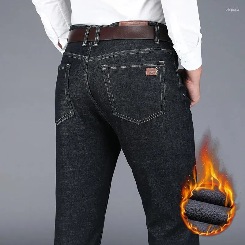 Męskie dżinsy zimowe ciepłe polarowe moda biznesowa klasyczny czarny niebieski dżins proste gęste aksamitne spodnie marki spodnie