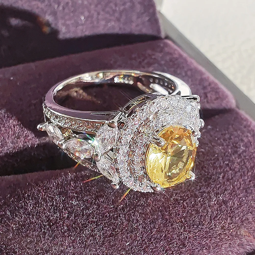 Kobiety luksusowy projektant Pierścień elipsa owalny inkrustowany żółty pełny 3a Moissanite Diamond Pierścienie biżuteria PT950 Prezent Girlfriend Prezenty zaręczynowe 1905