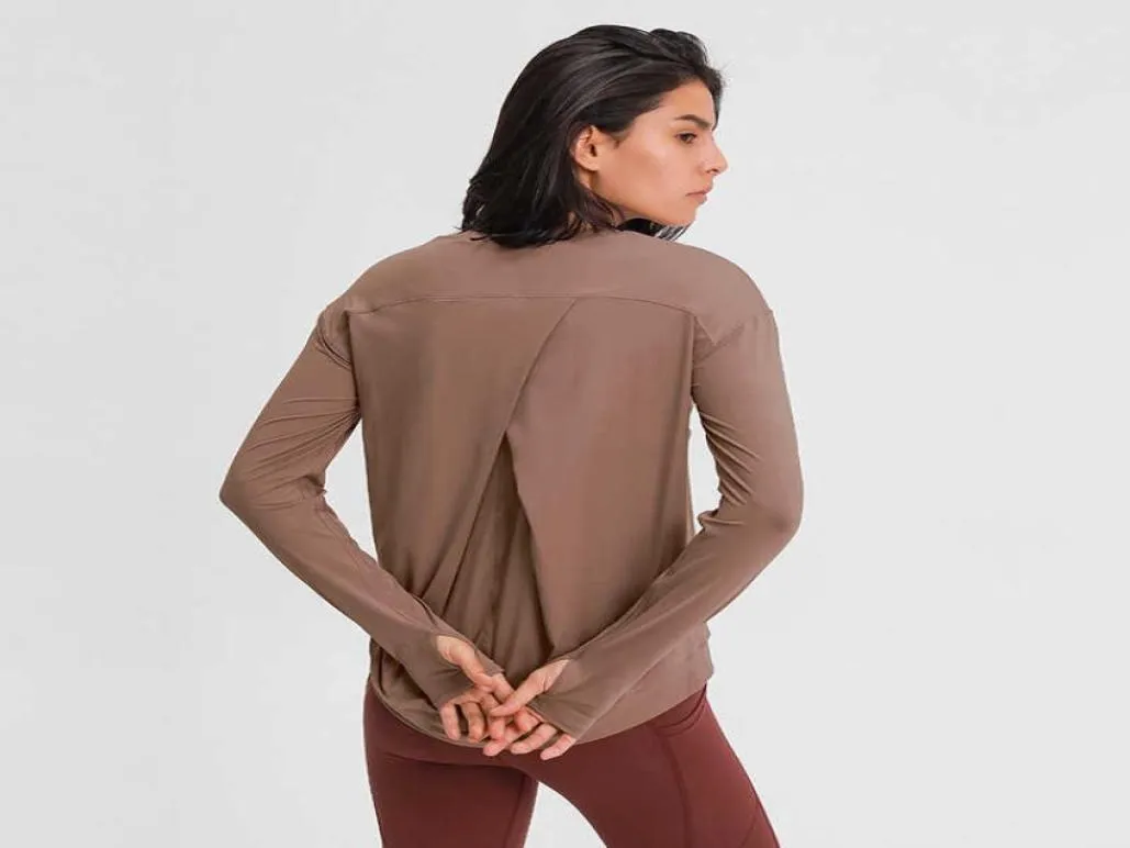 L20 Line Splicing Sport Manica lunga Yoga Top Abbigliamento da palestra Donna Tinta unita Semplice per il tempo libero Back Piece Cross Indoor Camicie2556041