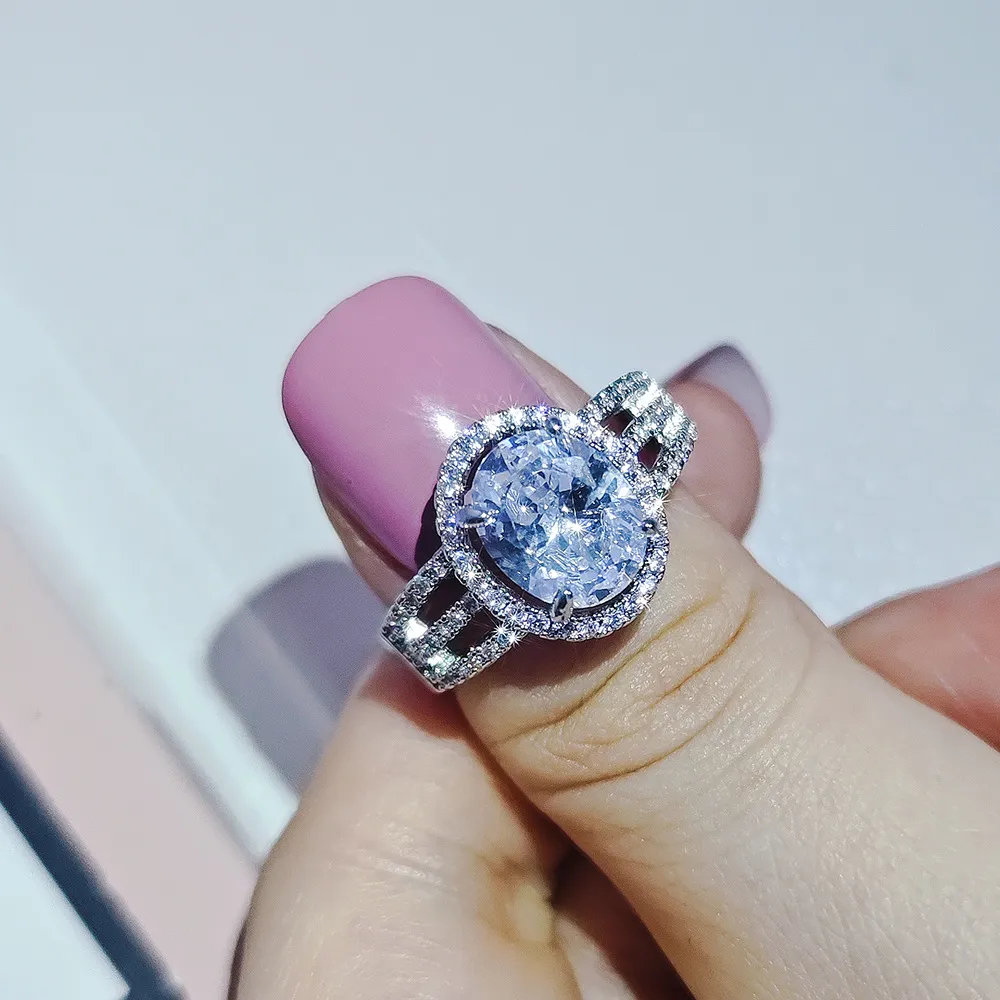 Kobiety luksusowy projektant Pure White Pierścień Elipsa Oval 3a Moissanite Diamond Pierścienie księżniczka Biżuteria PT950 Prezent Girlfriend Pirefm zaręczyny 1903