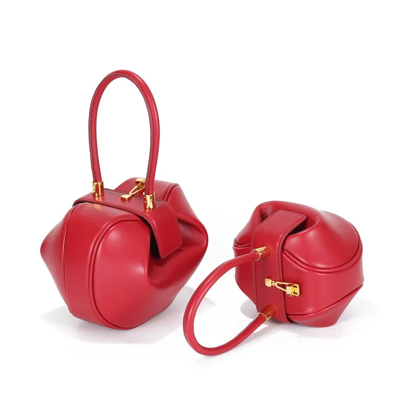 Elegant Evening Bag: Vintage Dumpling Design | Metallic Accents | Genuine Leather | Trendsetting & Versatile red brown