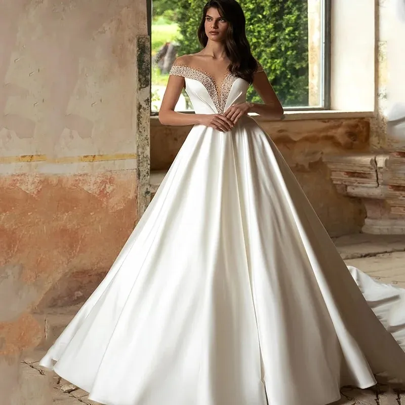 Elegante A-lijn Satijnen Trouwjurk 2024 Parels Kralen Uit Schouder Vloerlengte Formele Bruidsjurken Robe De Mariee Vestidos De Novia Custom Made