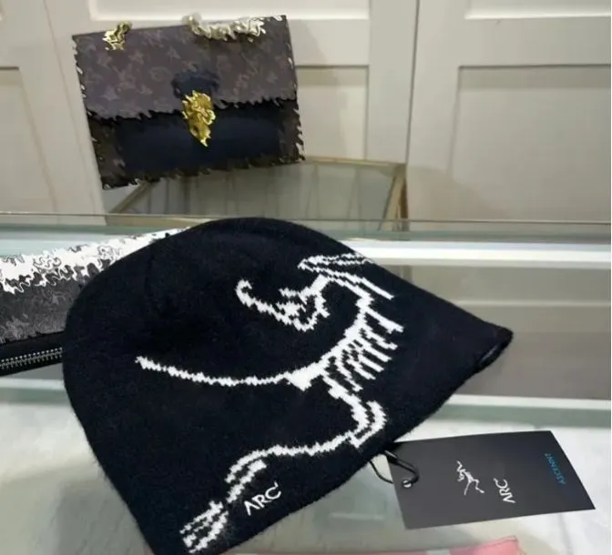 klassiker grotto toque stickad hatt kashmir mössa designer hatt kvinnors mäns fashionabla stickade hatt forntida fågellogotyp