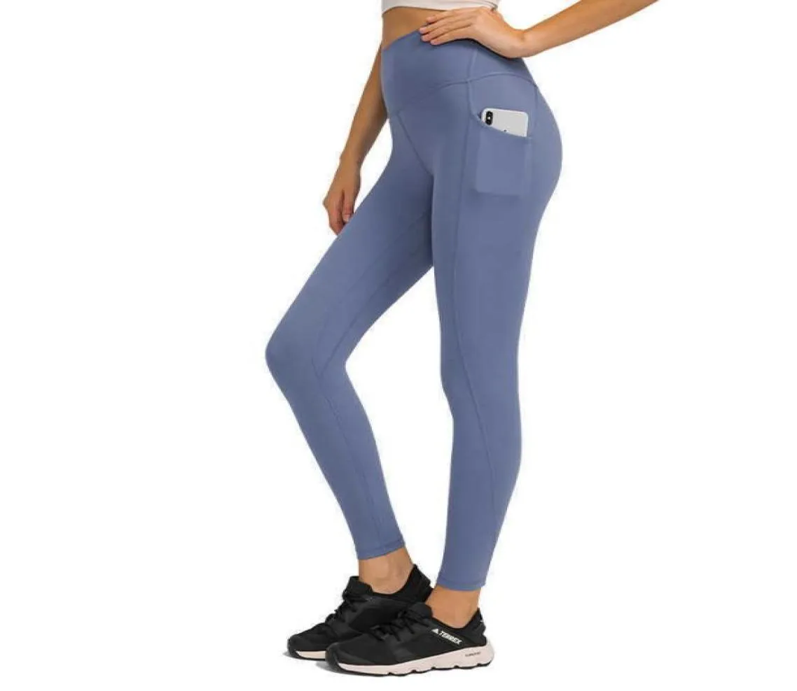 Mjuk vaxartad hudvänlig yogabyxor Sidficka Slim Fitness Running Sport Gym kläder Kvinnor Leggings Full Längd Tight Trouses2827906