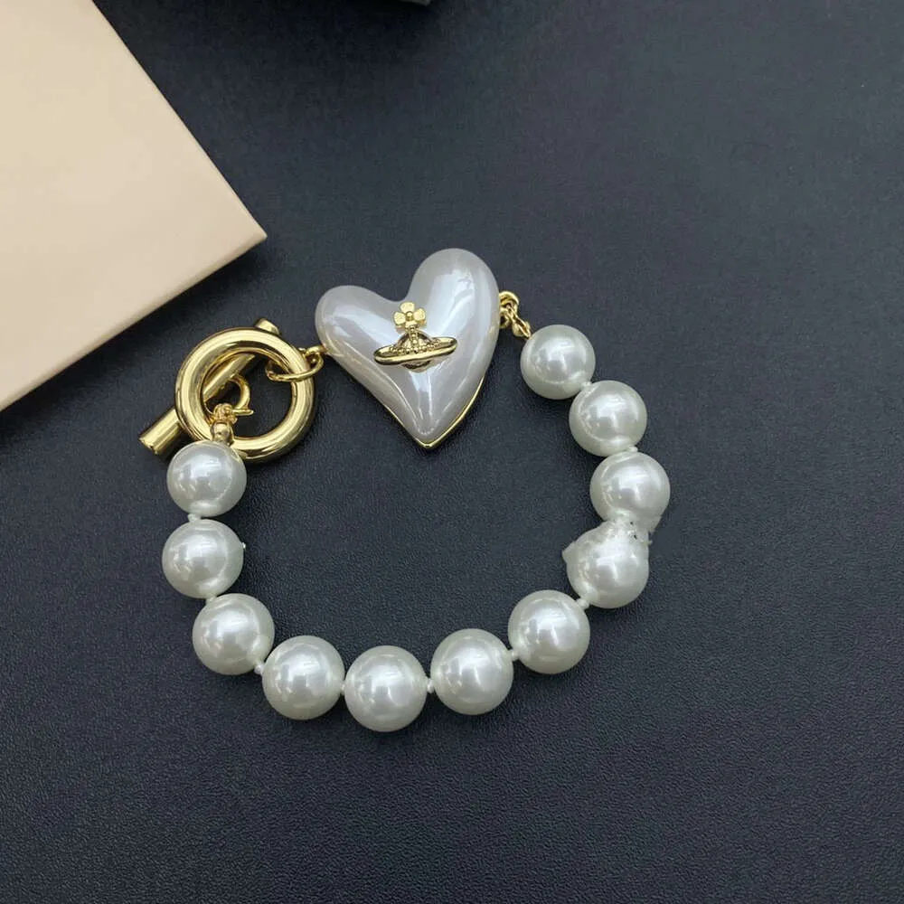 Designer Vivian Viviene High Version Empress Dowager Saturn Love Pearl Bracelet Women's Light Luxury Versatile Vivian Same Size Peach Heart Bracelet