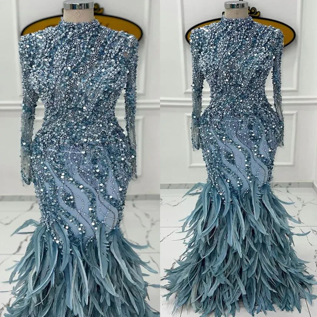 2023 designer sjöjungfru aftonklänningar långa ärmar hög hals glittrande sequis pärlor pärlstav fjäder golvlängd plus storlek prom klänning formell anpassad vestidos