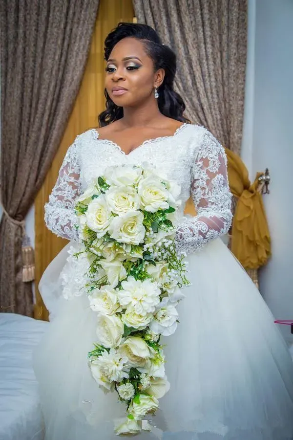 Scalloped lace and tulle top plus size wedding dress