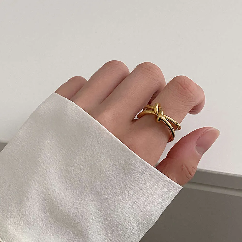 Bandringen Designer Hoge kwaliteit Kleine menigte Eenvoudige lijn Gebakken deegwendingen Ring Vrouwelijke opening Verstelbare ring Wijsvingerring Staartring Koud Wi