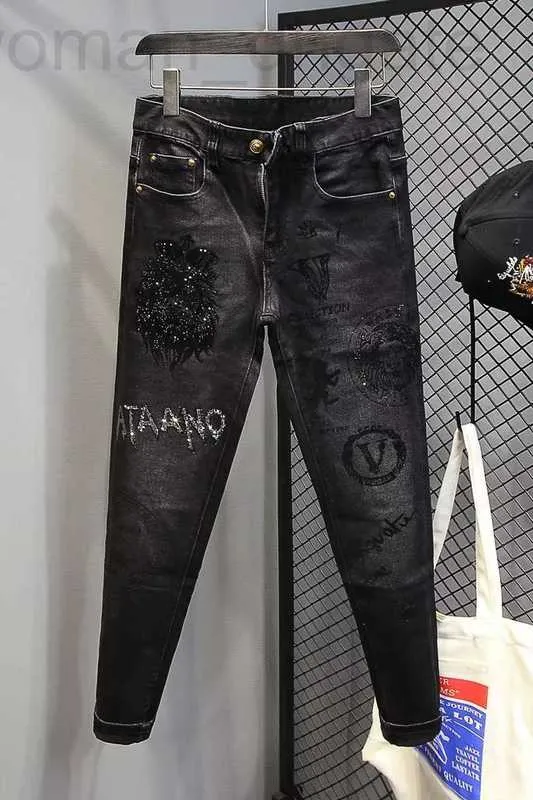 Mäns jeansdesigner Spring och Autumn New Fashion Märke för män Tung industrin Hot diamanttryck elastisk passform mångsidig svarta byxor 9tkj