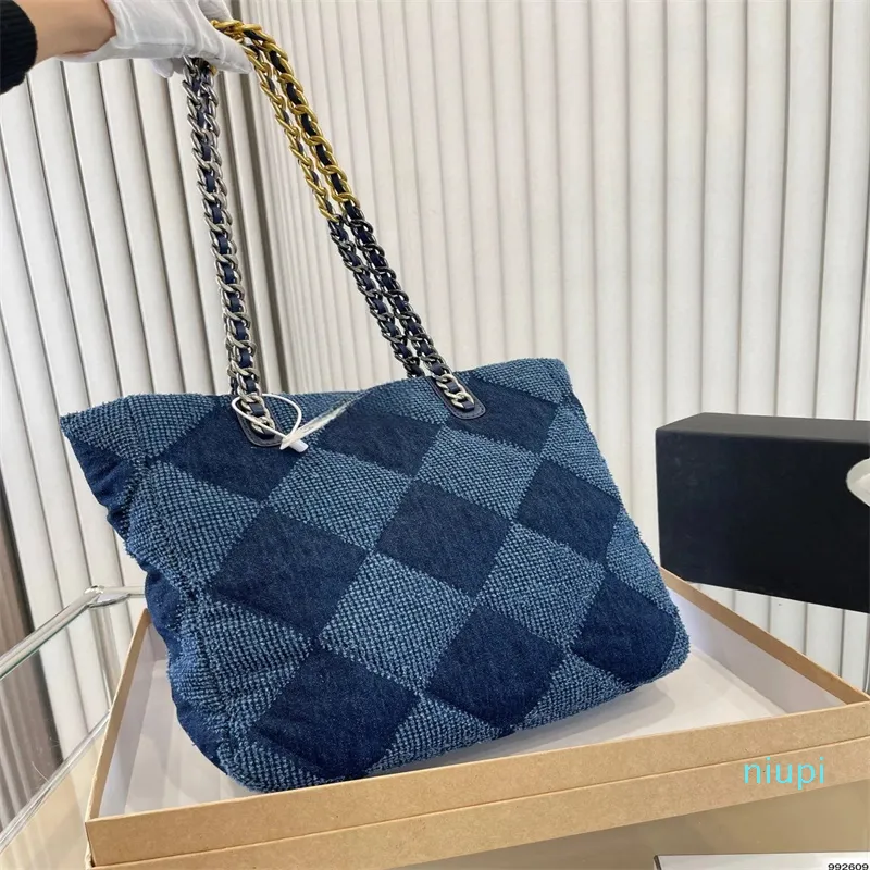 Designer -väska denim shopping tote ryggsäck rese kvinna sling kroppsväska dyraste handväska med silverkedja gabrielle quiltade lyxiga handväskor