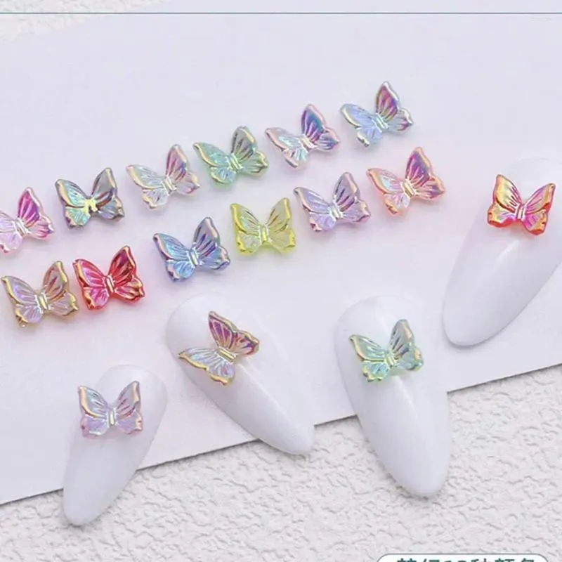 Décorations d'art d'ongle 100pcs / lot Aurora Butterfly Charm 6mm Ice Fantaisie Papillons 3D Ailes Strass Partie