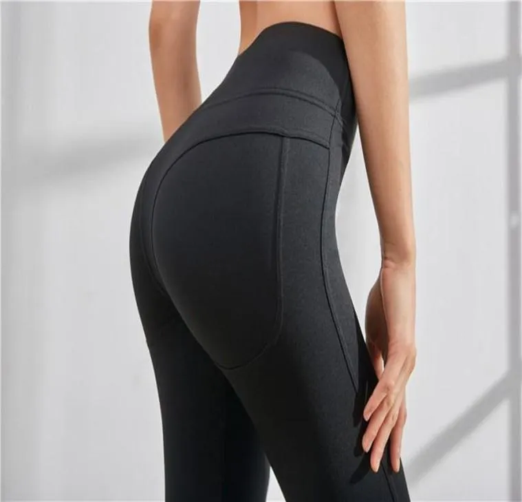 Solid Color Yoga Pants for Women High midja Tight träning Yoga Gym Leggings Elastic Full Strumpbyxor för inomhus och utomhus jogging3323516