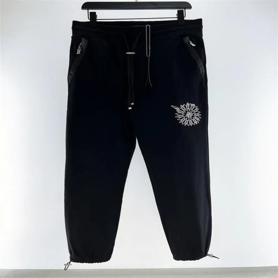 Pantalones para hombre Diseñadores Hombres Pantalones casuales Pentagrama de diamante artificial Alta calidad Hombres Mujeres Chándales Moda Pantalón Hip Hop 248N