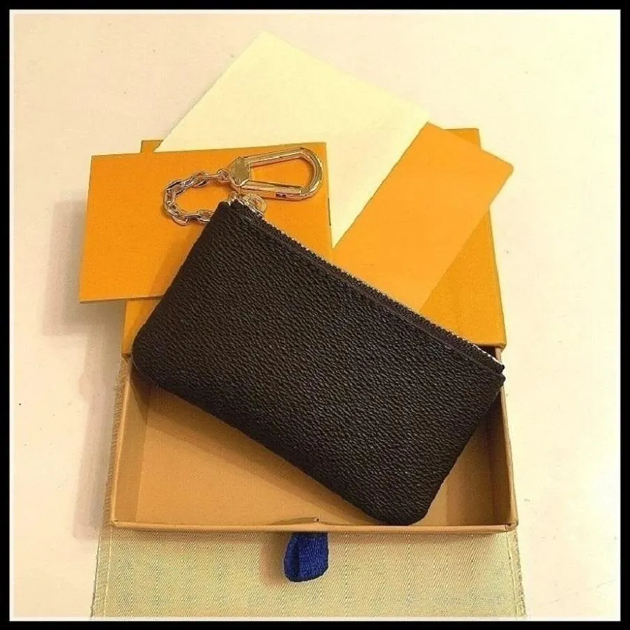 Дизайнеры кошельки ключевой мешочек Pochette CLES Women Mens Key Ring Holder Loxurys Covers Mini Wallet Charm Canvas M626502822